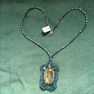 Green and Purple Labradorite Turtle Necklace with Intricate Beadwork